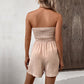 🔥🎁Nyhet 50 % RABATT🔥Axelbandslös Byxdress med Volangkant, Smockliv, Knytdetalj Framtill och Vida Ben för Dam
