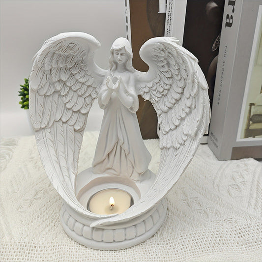 Ljusstake med figur av bedjande ängel