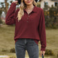 Enfärgad pullover med knappar och sweatshirt för kvinnor
